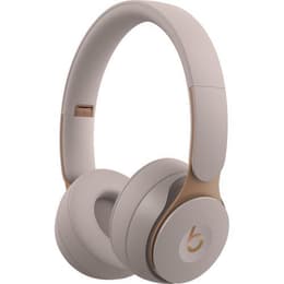 Beats By Dr. Dre Solo Pro noise-Cancelling wireless Headphones with microphone - Beige