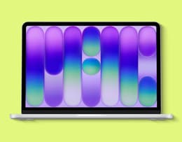 Apple MacBook Neo open with the screen showing colours.